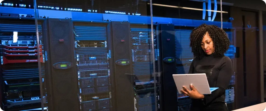 Engineer working in a server room checking MTTR