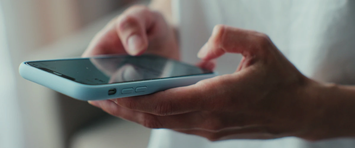 Verizon Email-To-Text Alternative Someone holding a smartphone