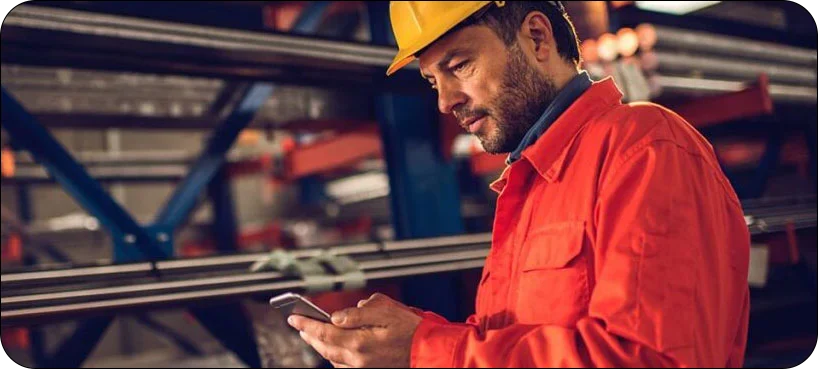 Engineer using critical event management platform in industry